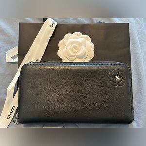 Authentic Chanel Camellia black leather long zip around wallet